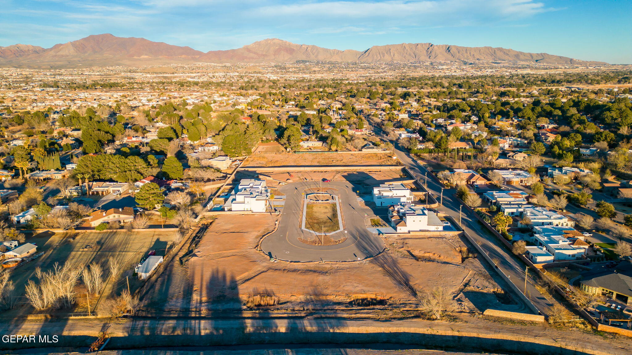 848 West Gate El Paso, TX 79932 - Photo 5 of 7 an aerial view of residential houses with outdoor space and trees