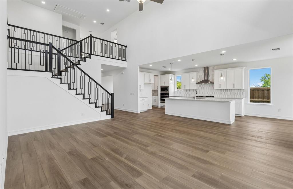 11220 Abbotsbury Road Fort Worth, TX 76052 - Photo 6 of 32 a view of kitchen with wooden floor and electronic appliances