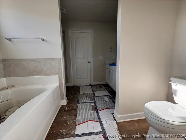 a bathroom with a sink and a toilet