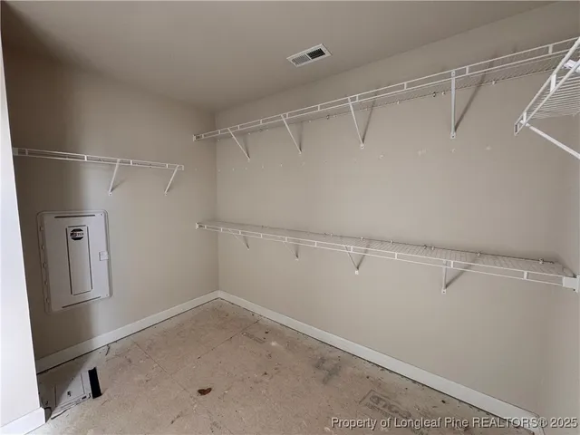 a view of a room with racks on the wall