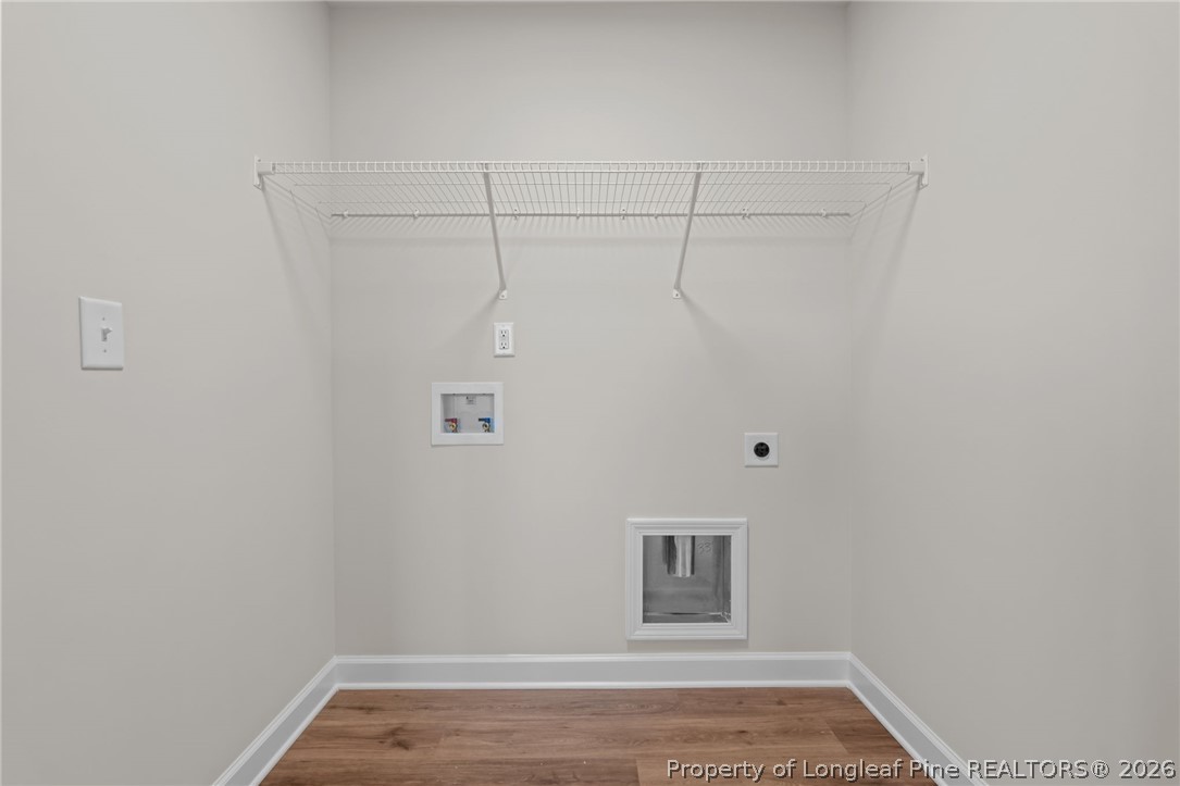 290 Elijah Way Vass, NC 28394 - Photo 37 of 45 a view of a room with racks on the wall