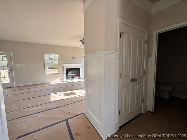 a view of living room and a fireplace