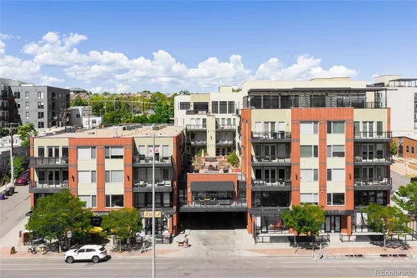 a front view of a building with street view