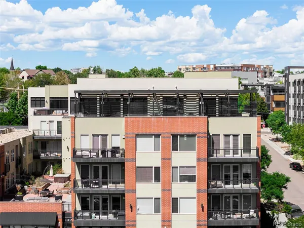 a front view of a building with glass windows