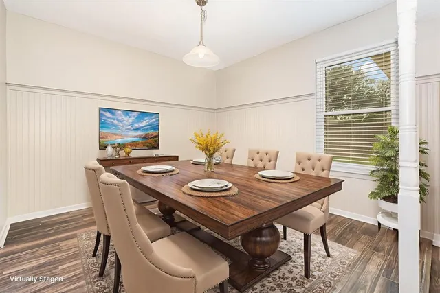 a view of a dining room with furniture