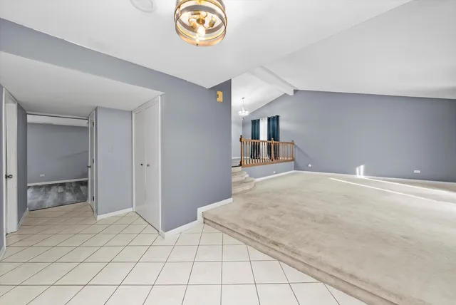 a bathroom with a toilet a sink and a mirror