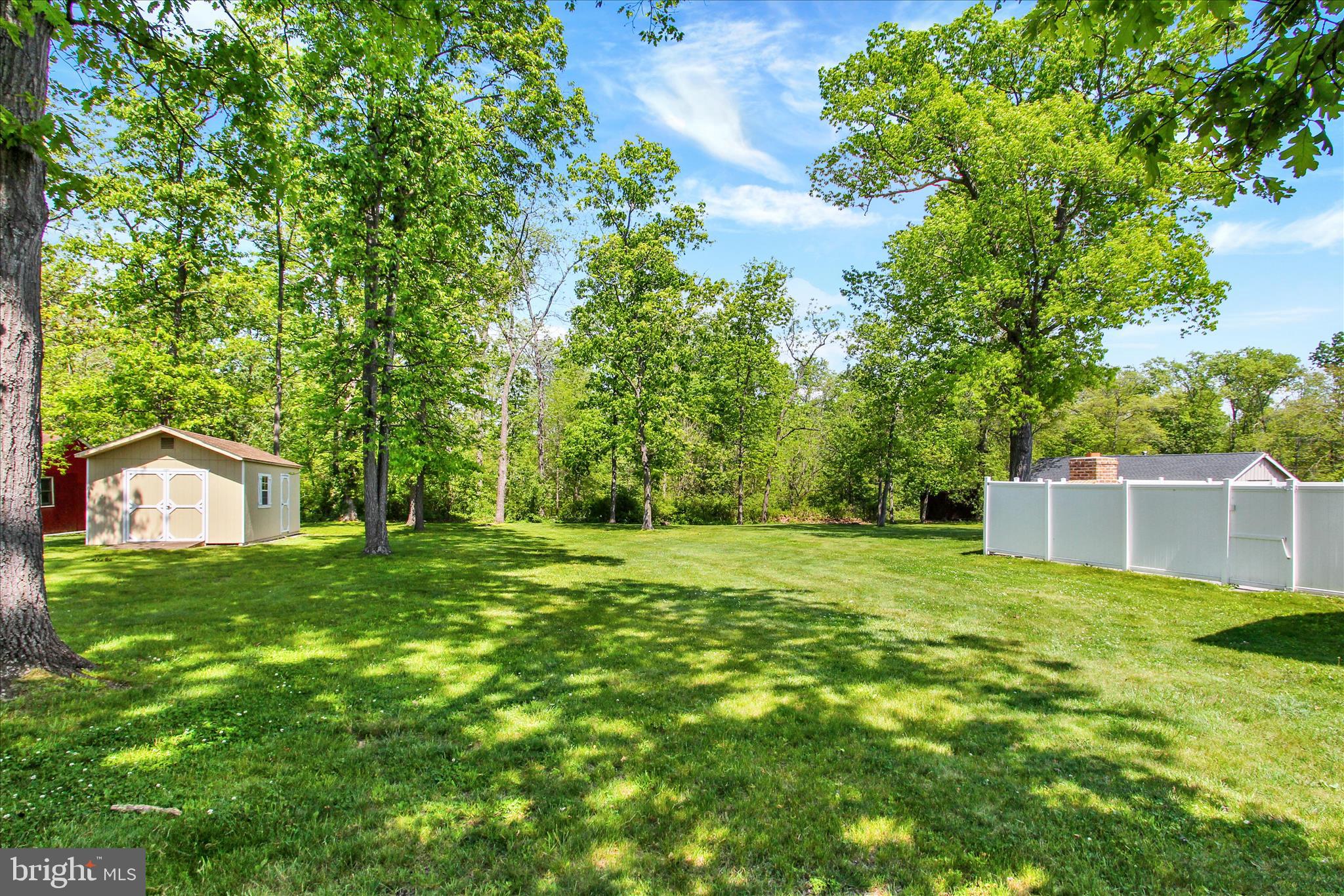 2275 Mummasburg Road Gettysburg, PA 17325 - Photo 28 of 31 a view of a big yard with plants and large trees