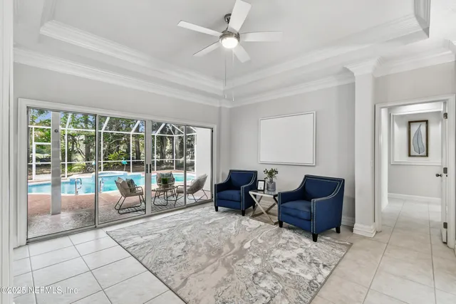 a kitchen with sink and white cabinets