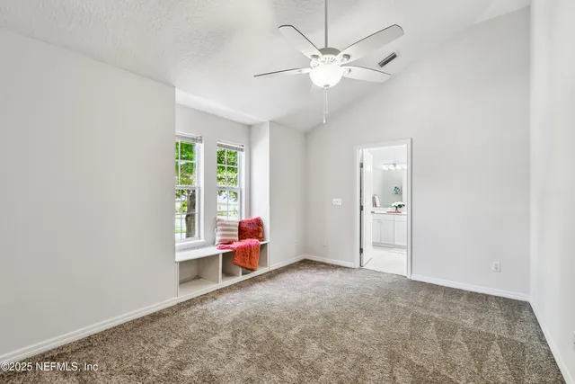 a view of a lake with a big yard