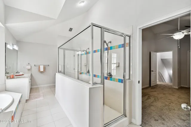 a view of a swimming pool with palm trees