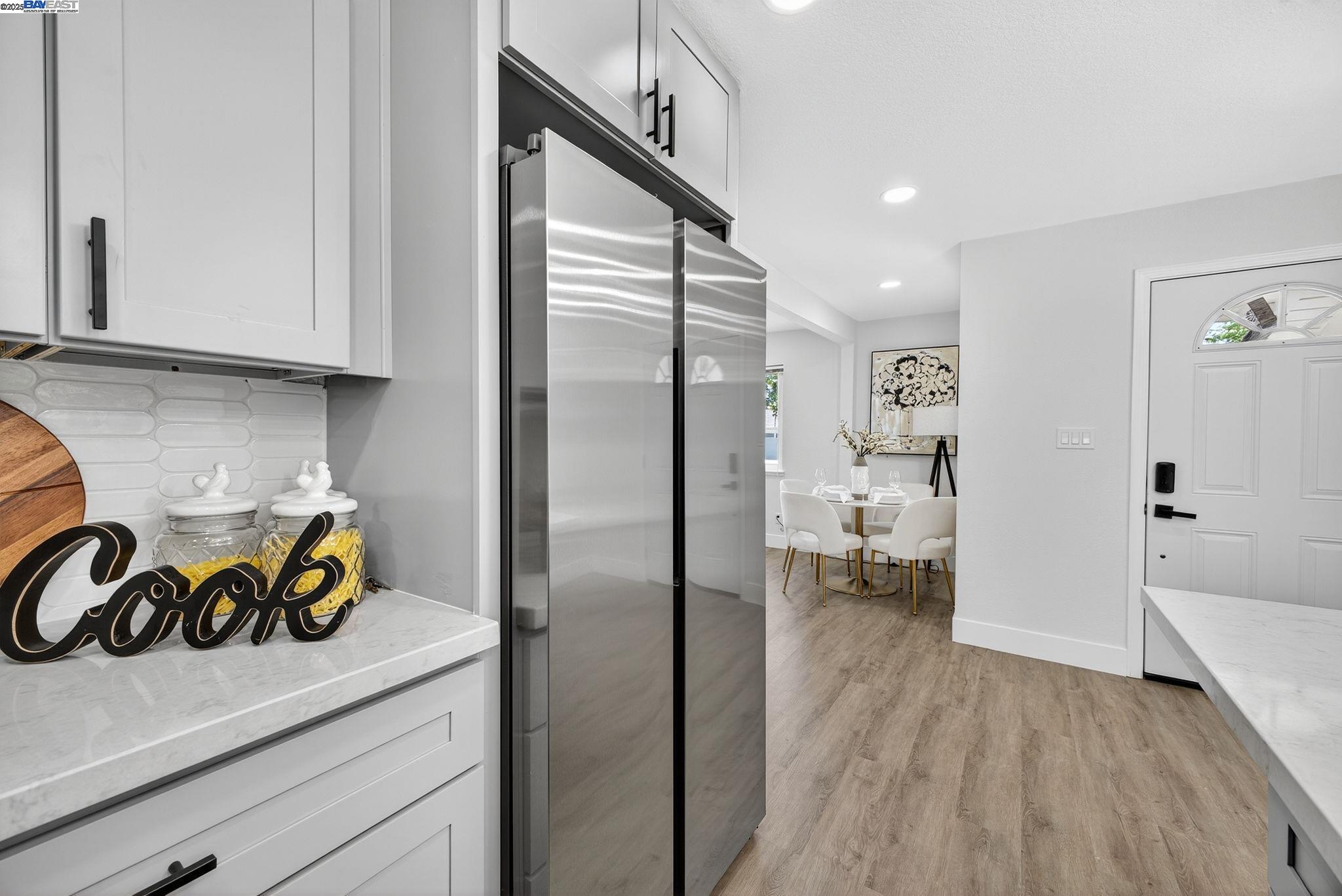 4403 Burke Way Fremont, CA 94536 - Photo 12 of 58 a kitchen with a refrigerator and a stove
