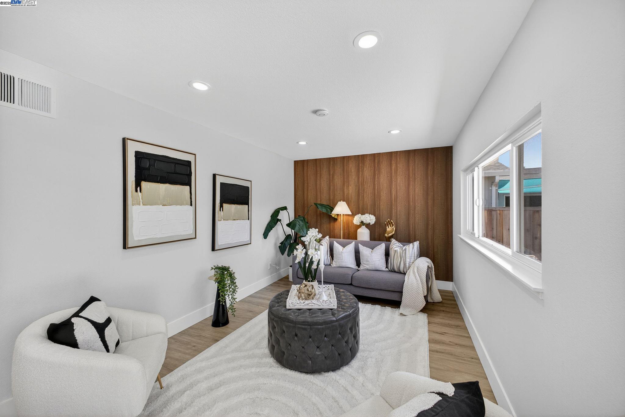 4403 Burke Way Fremont, CA 94536 - Photo 17 of 58 a living room with furniture and a large window