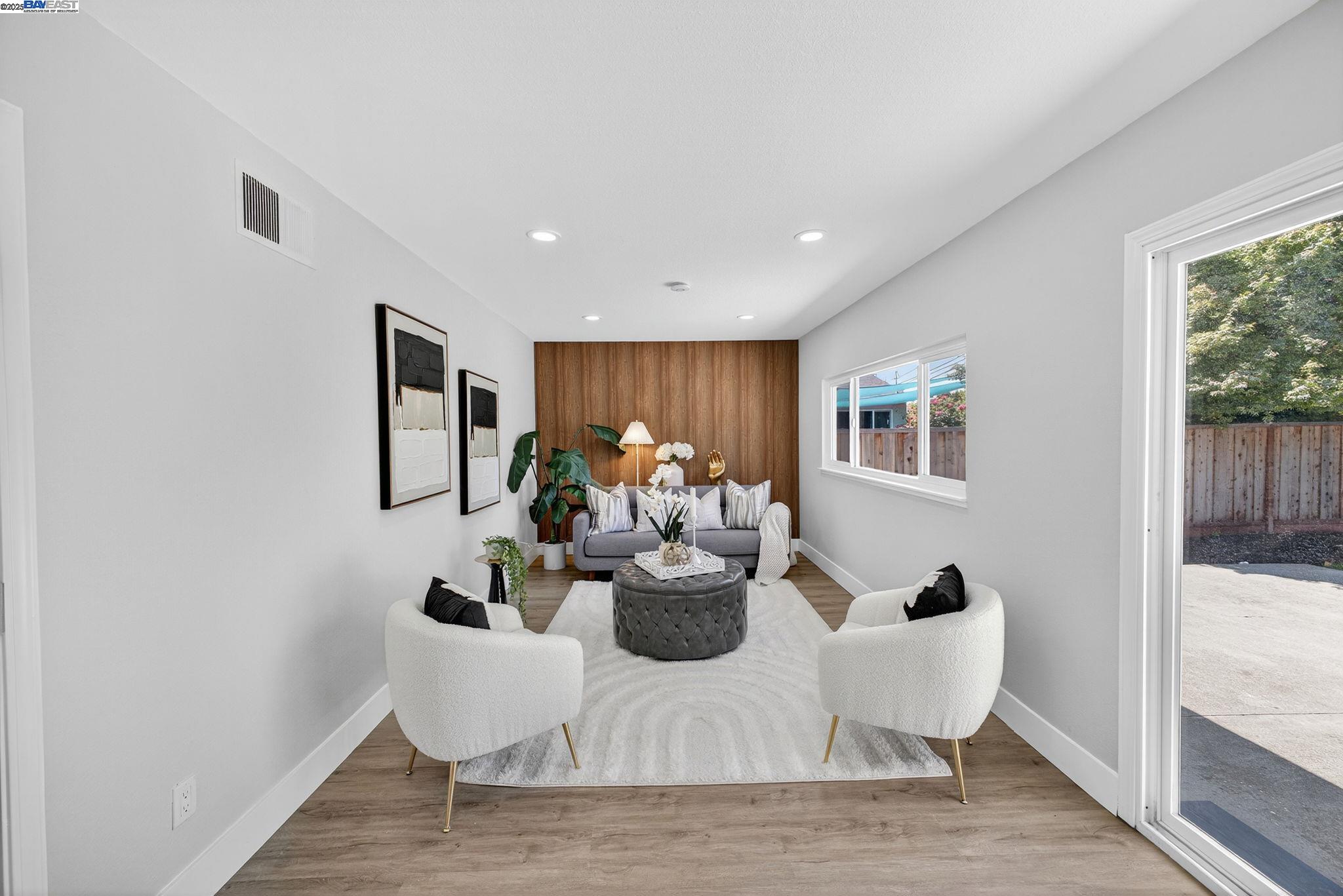 4403 Burke Way Fremont, CA 94536 - Photo 18 of 58 a dining room with furniture and wooden floor