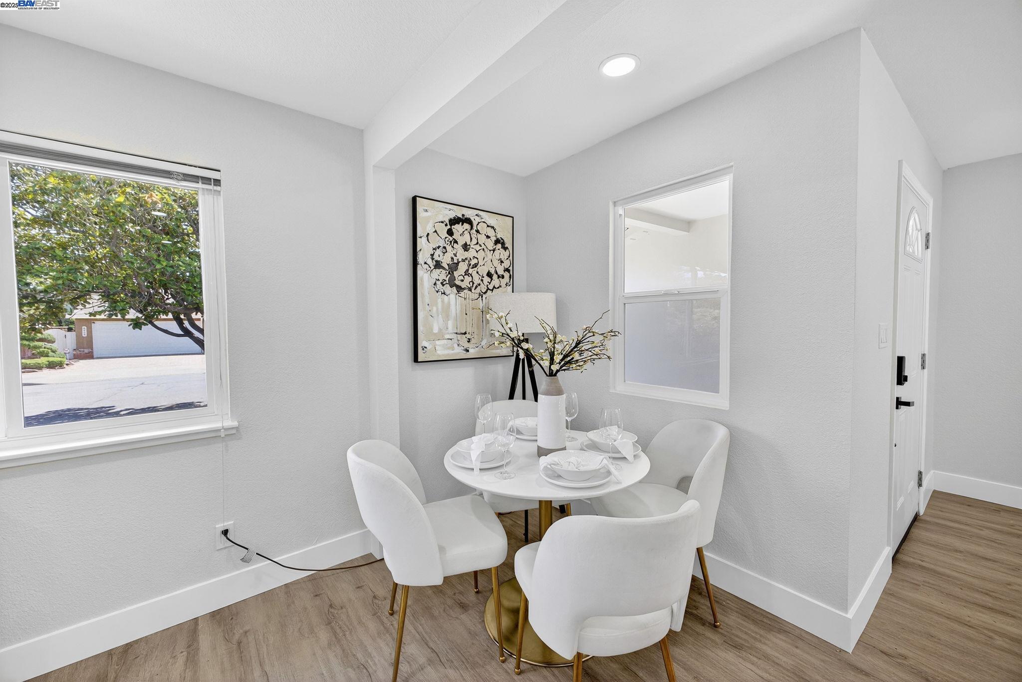 4403 Burke Way Fremont, CA 94536 - Photo 21 of 58 a view of a dining room with furniture window and wooden floor