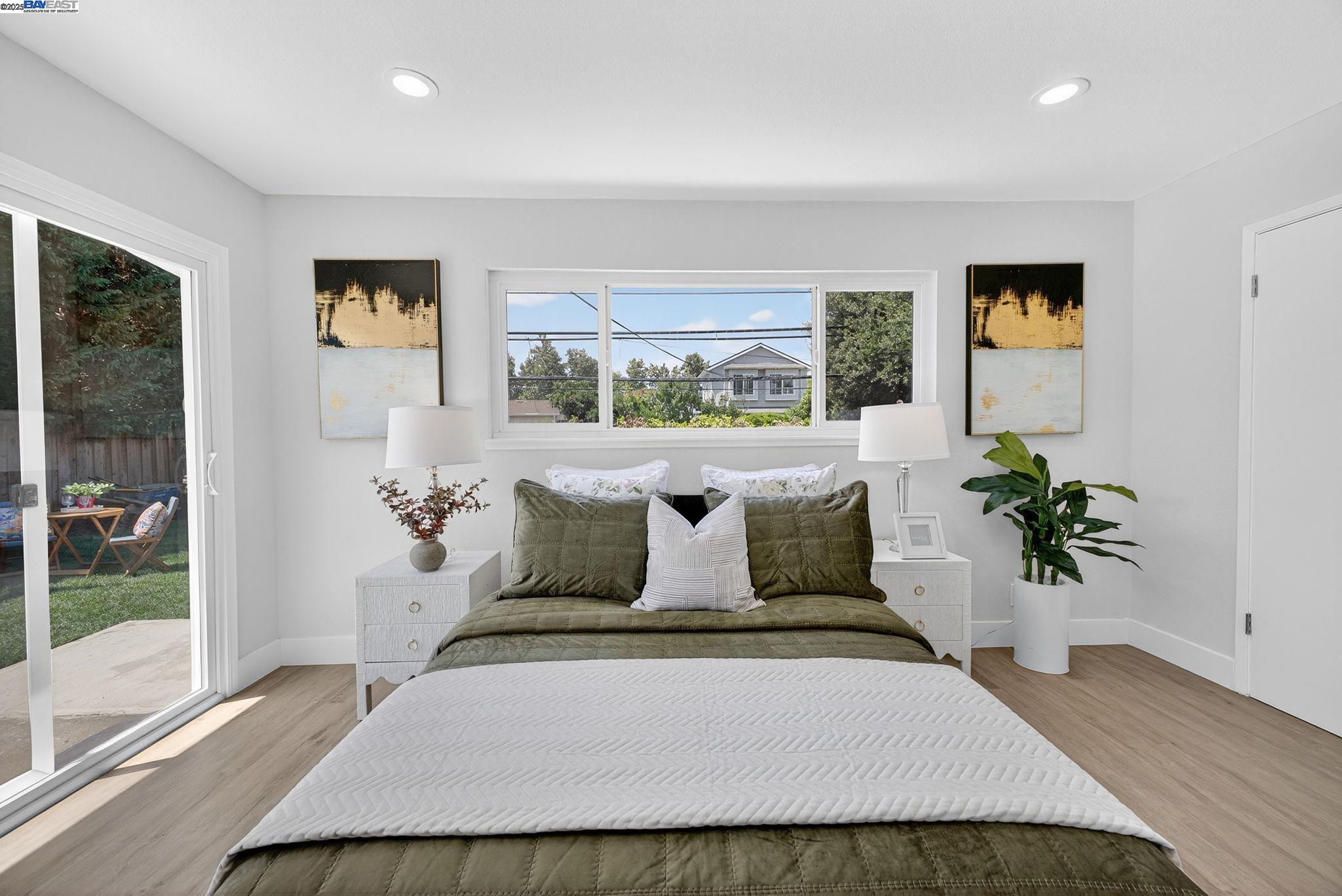 4403 Burke Way Fremont, CA 94536 - Photo 25 of 58 a living room with furniture and a potted plant