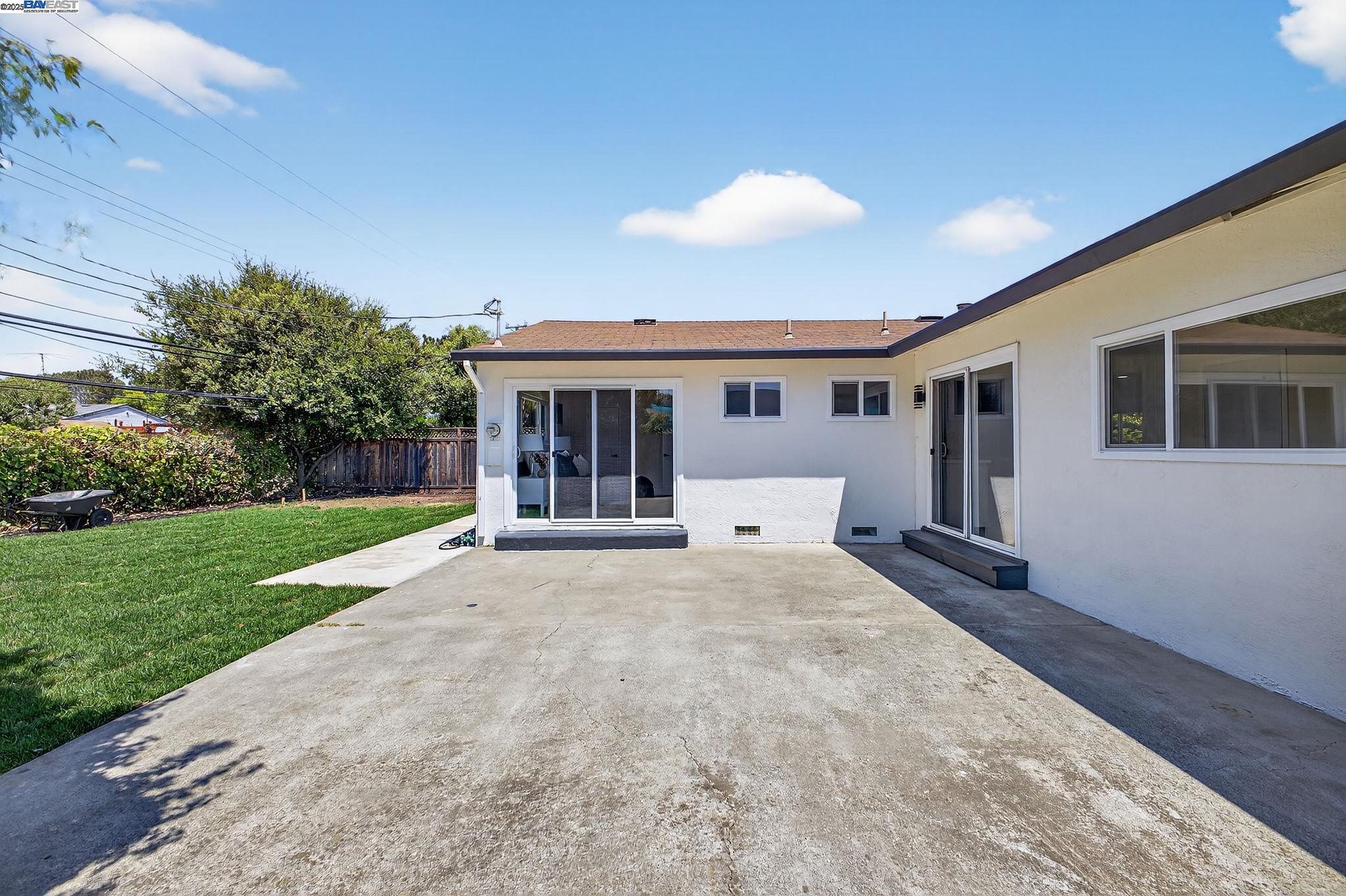 4403 Burke Way Fremont, CA 94536 - Photo 40 of 58 a front view of house with yard and green space