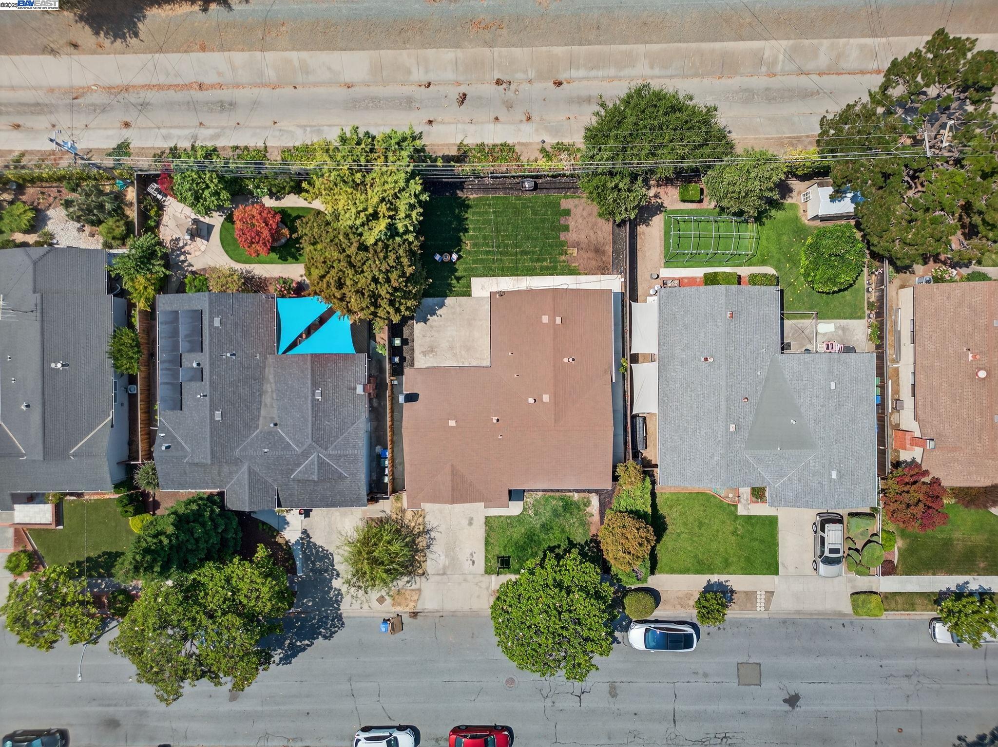 4403 Burke Way Fremont, CA 94536 - Photo 4 of 58 an aerial view of a house with a yard and garden