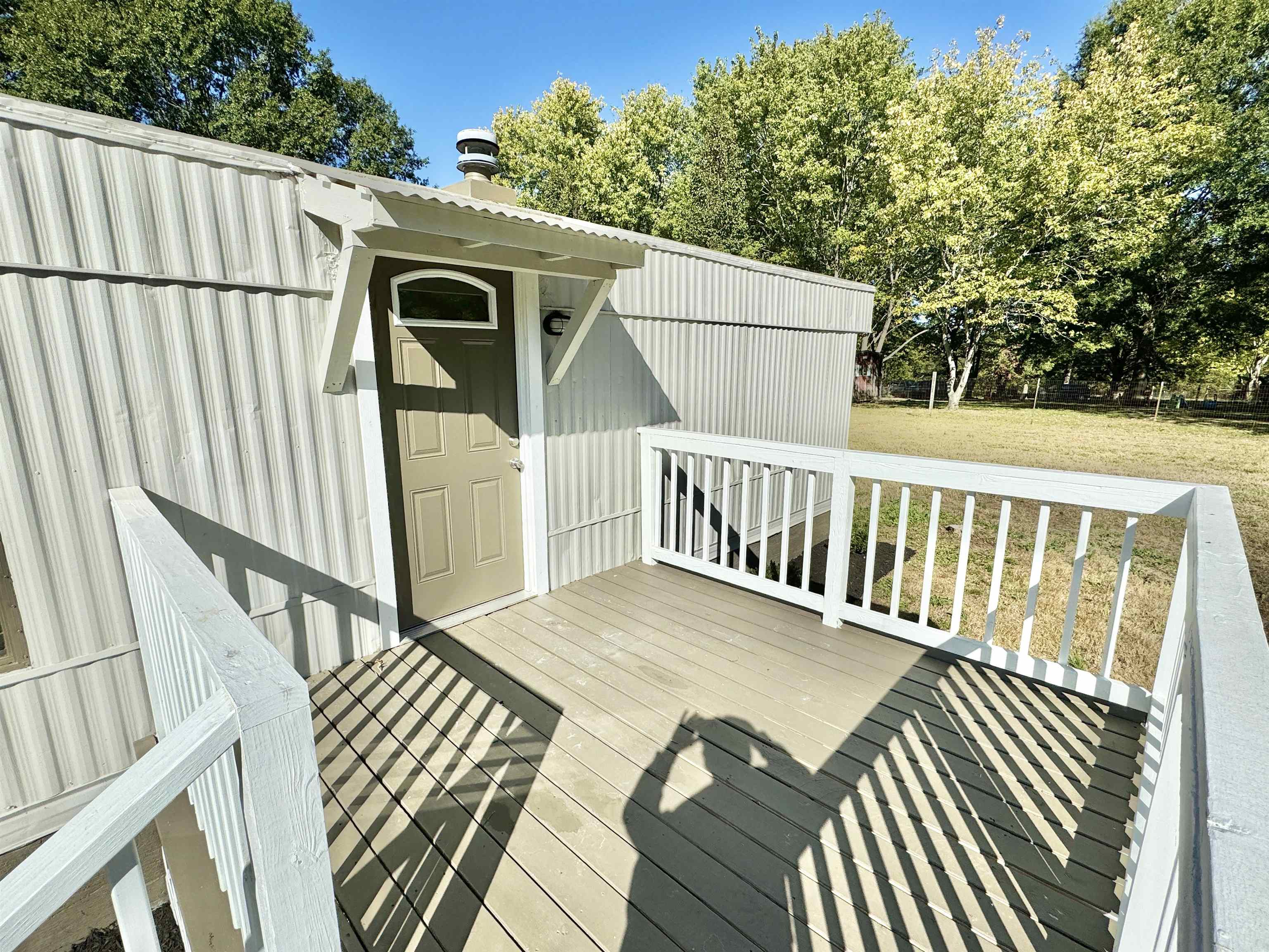 285 Hicks Road Oakland, TN 38060 - Photo 10 of 24 Wooden terrace featuring a lawn