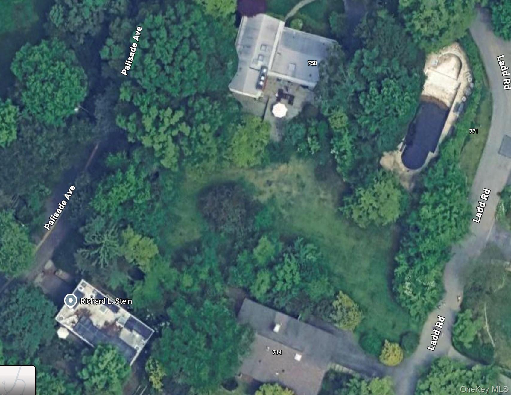 Ladd Road Bronx, NY 10471 - Photo 16 of 16 an aerial view of a house with a yard basket ball court and outdoor seating