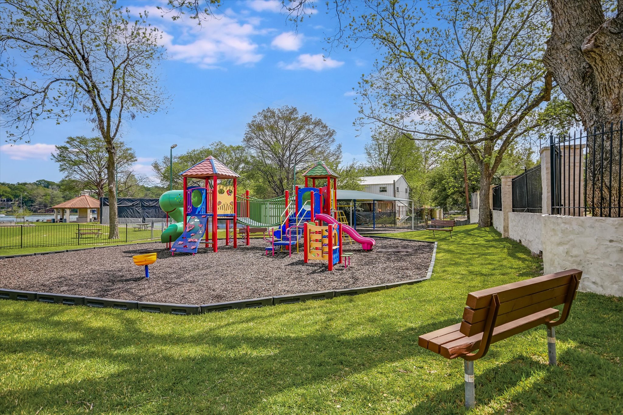 3901 Prentice Lane Austin, TX 78746 - Photo 34 of 40 A gated playground offers a welcoming play area.