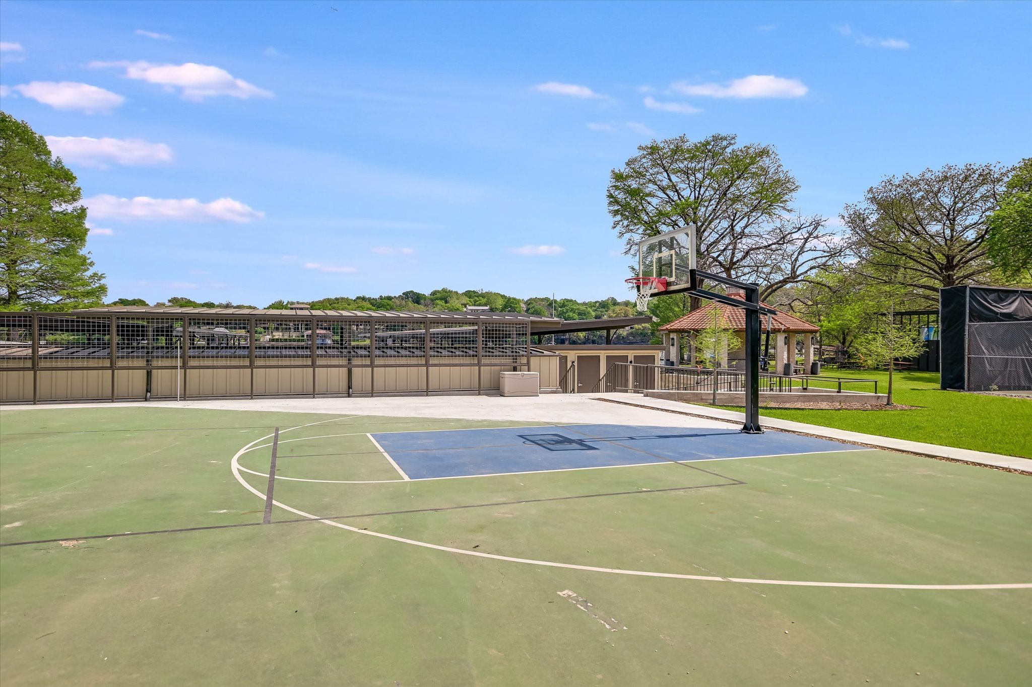 3901 Prentice Lane Austin, TX 78746 - Photo 36 of 40 A dedicated basketball court provides space for friendly games and outdoor recreation.