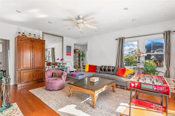 a play room with furniture and a window