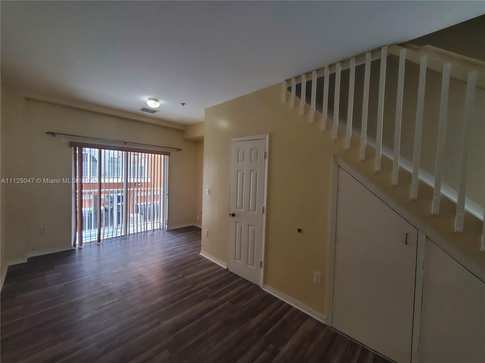 928 Southwest 3rd Street, Unit 203 Miami, FL 33130 - Photo 8 of 16 a view of entryway with wooden floor
