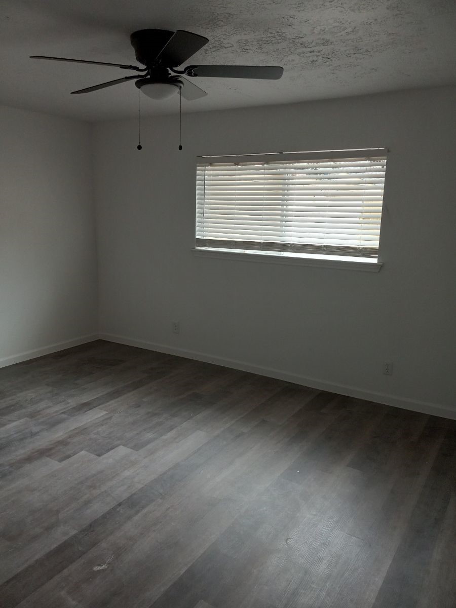 2681 Gessner Road, Unit 402 Houston, TX 77080 - Photo 2 of 11 a view of an empty room with a window