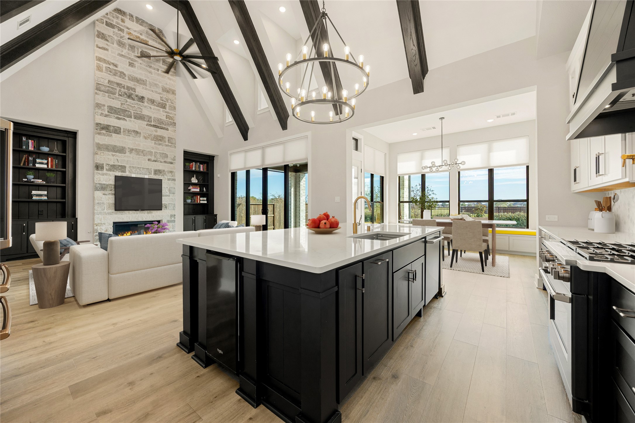 6707 Nimitz Court Katy, TX 77493 - Photo 11 of 43 a kitchen with stainless steel appliances granite countertop a stove and cabinets