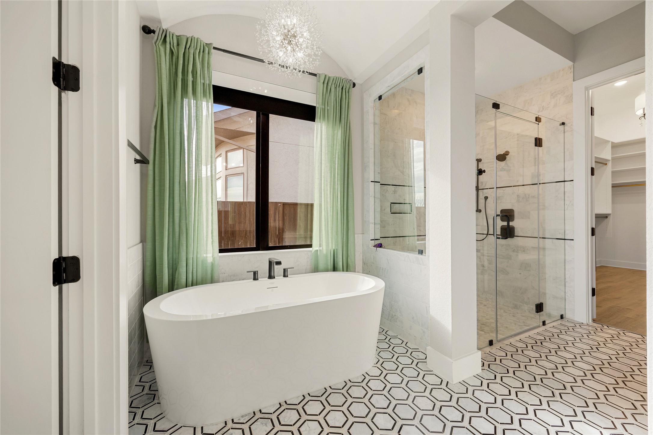 6707 Nimitz Court Katy, TX 77493 - Photo 17 of 43 a bathroom with a bathtub and shower