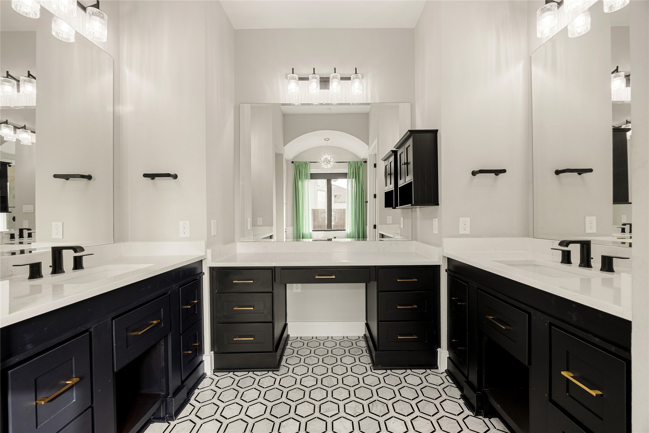 6707 Nimitz Court Katy, TX 77493 - Photo 19 of 43 a spacious bathroom with double vanity and a mirror