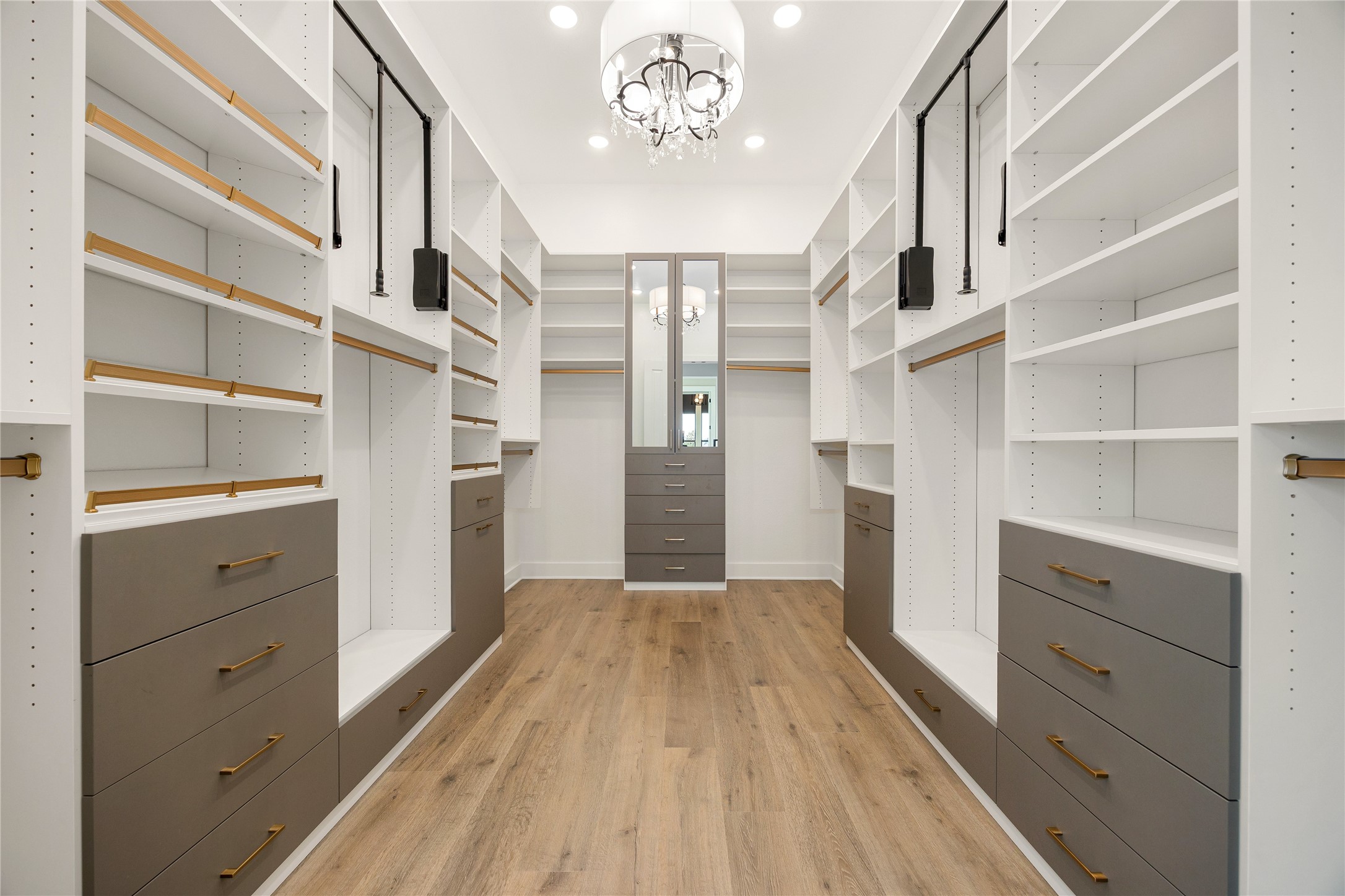 6707 Nimitz Court Katy, TX 77493 - Photo 20 of 43 a view of walk in closet with empty racks