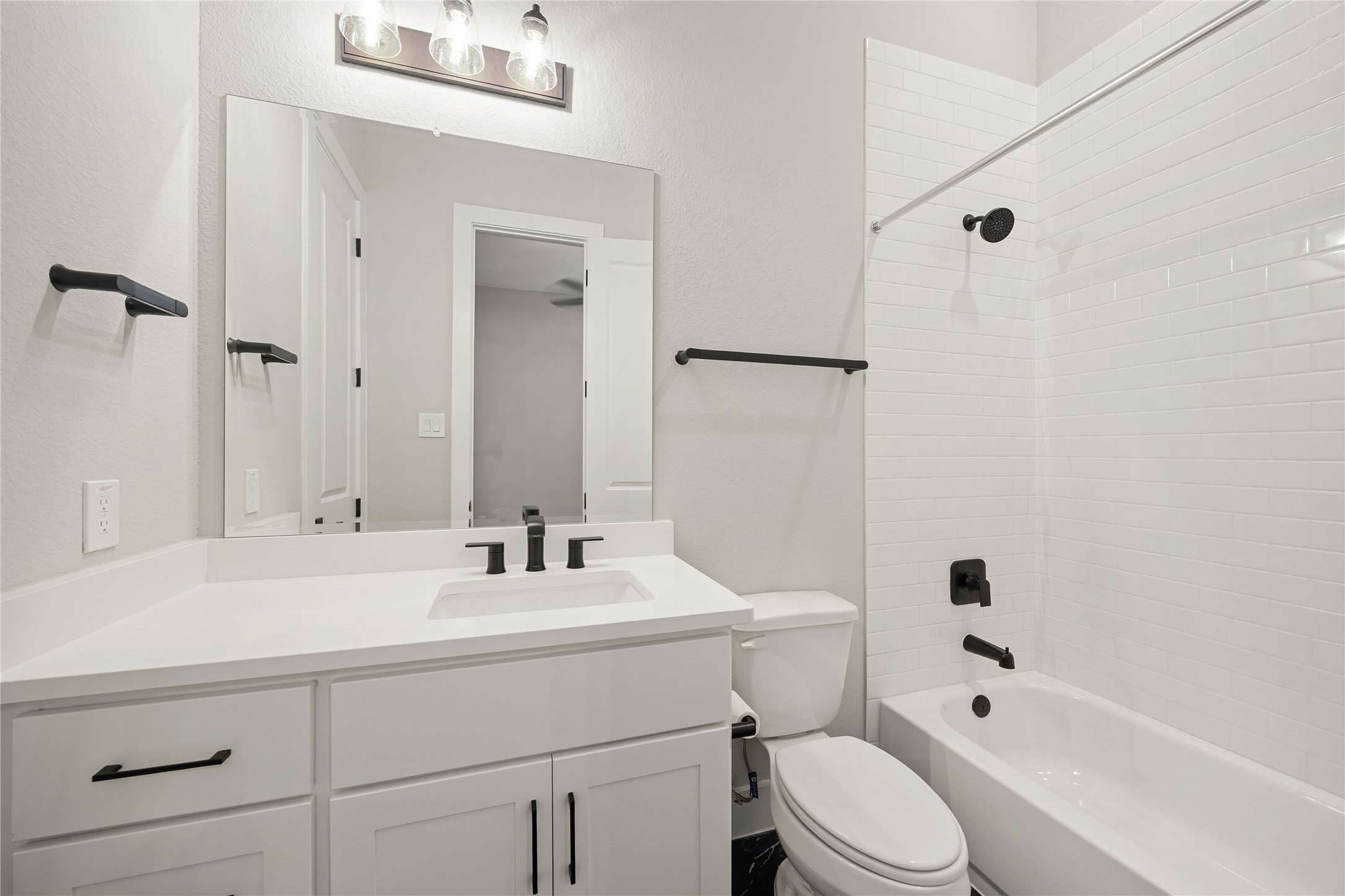 6707 Nimitz Court Katy, TX 77493 - Photo 24 of 43 a bathroom with a sink a toilet and shower