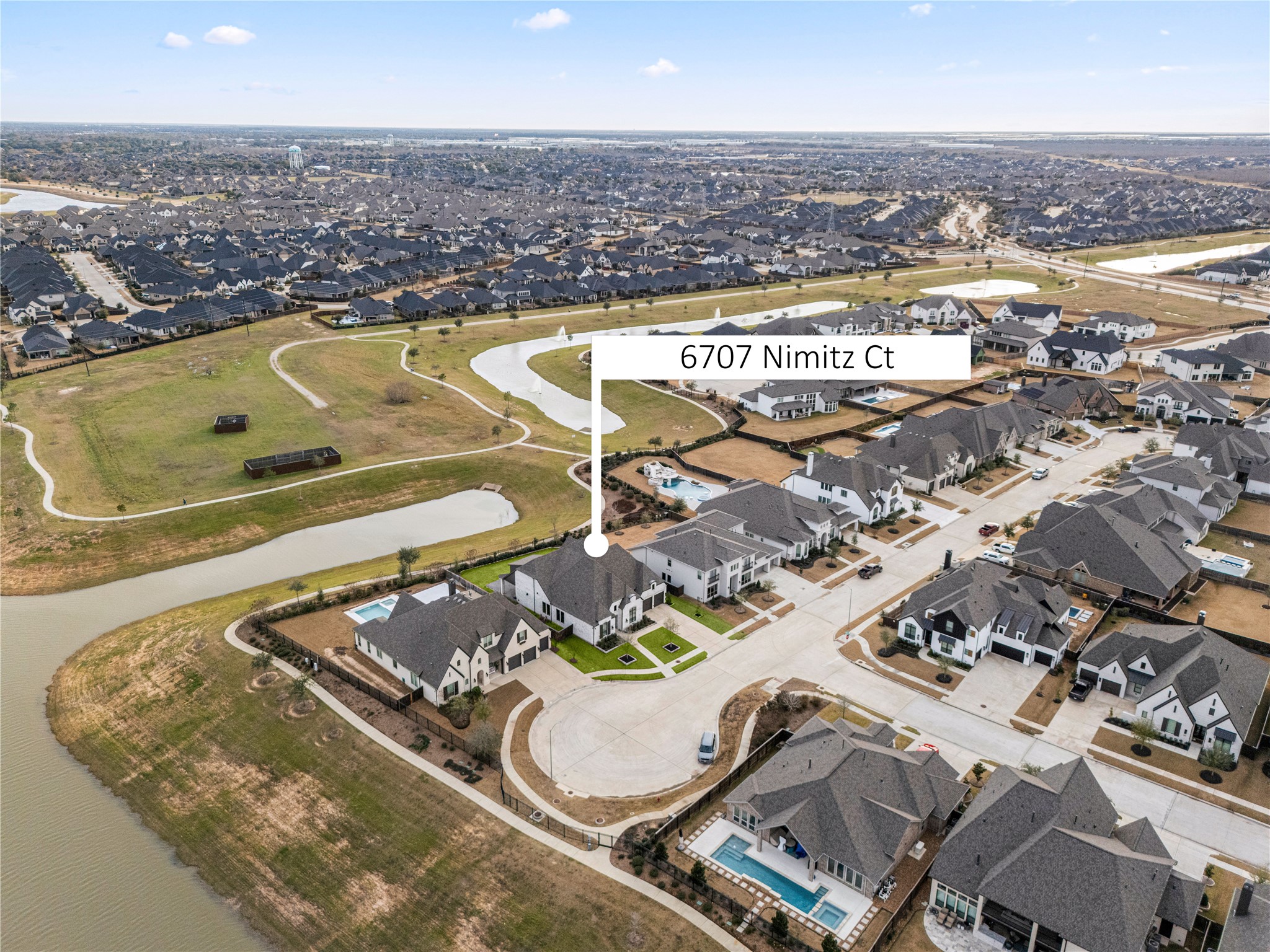 6707 Nimitz Court Katy, TX 77493 - Photo 36 of 43 an aerial view of residential houses with outdoor space