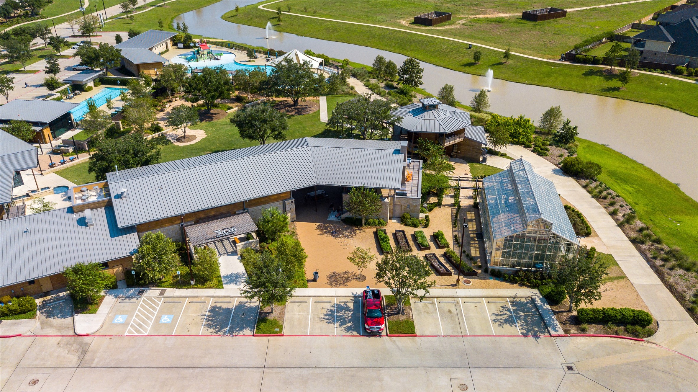 6707 Nimitz Court Katy, TX 77493 - Photo 40 of 43 an aerial view of a house with a yard and a fountain