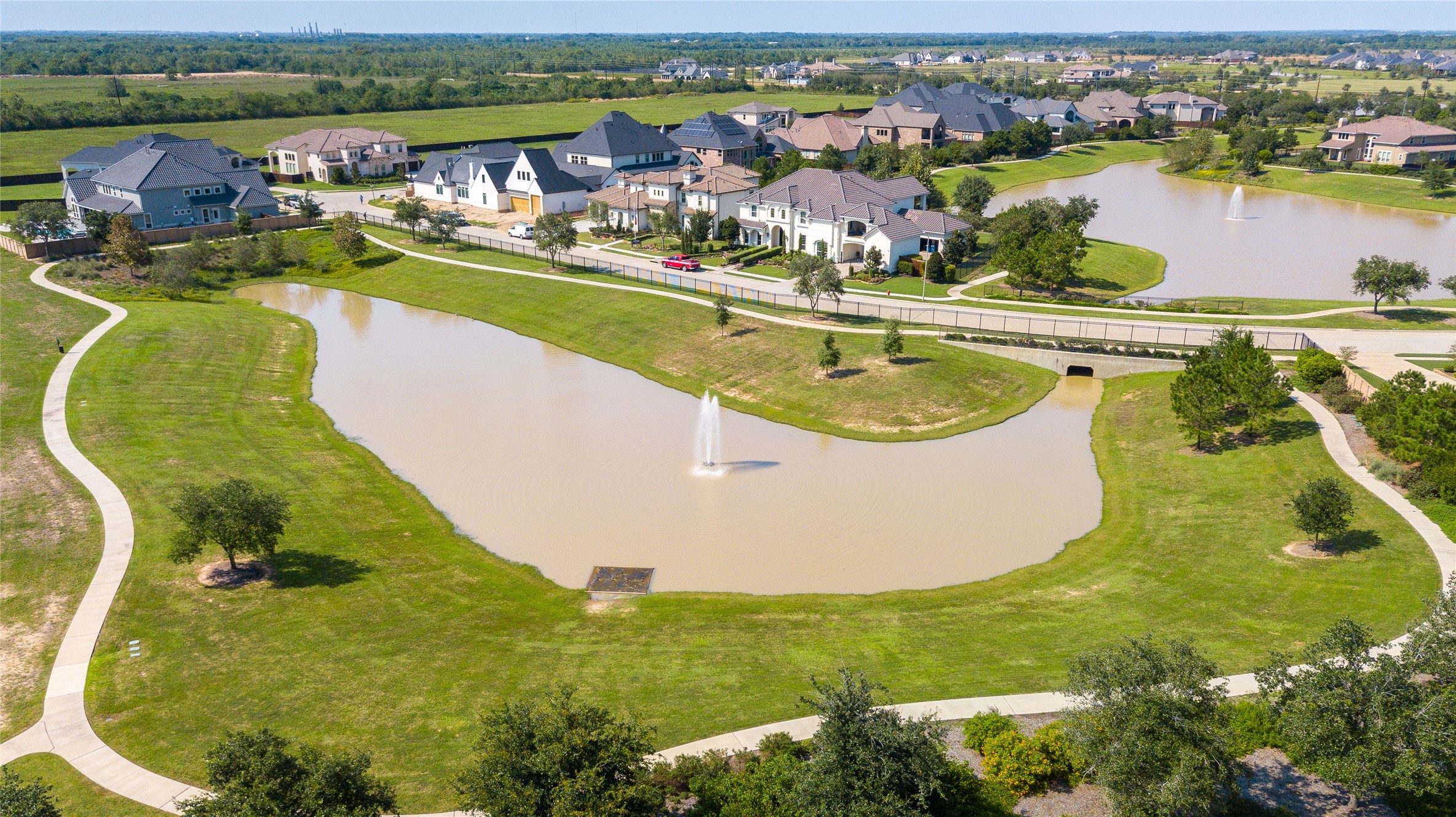 6707 Nimitz Court Katy, TX 77493 - Photo 41 of 43 an aerial view of a house with a lake view