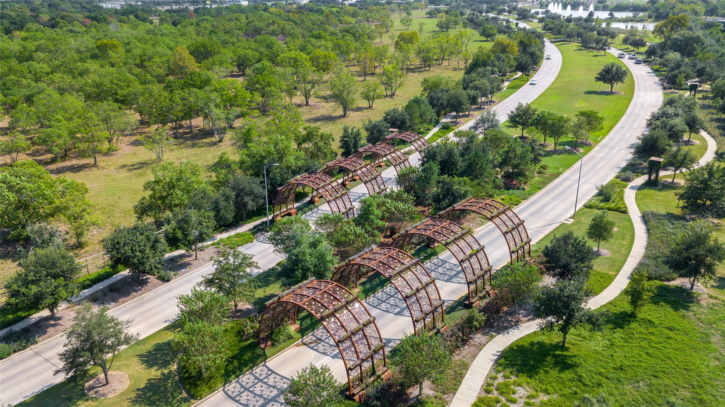 6707 Nimitz Court Katy, TX 77493 - Photo 42 of 43 an aerial view of lake residential house with outdoor space and trees all around