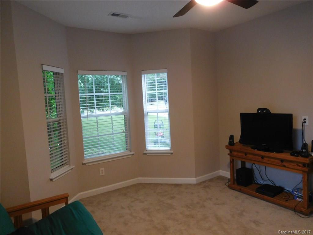 823 Knightsbridge Road Fort Mill, SC 29708 - Photo 11 of 24 a view of room with hardwood floor and workspace