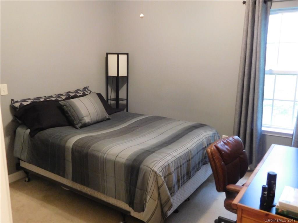 823 Knightsbridge Road Fort Mill, SC 29708 - Photo 17 of 24 a bedroom with a bed and window