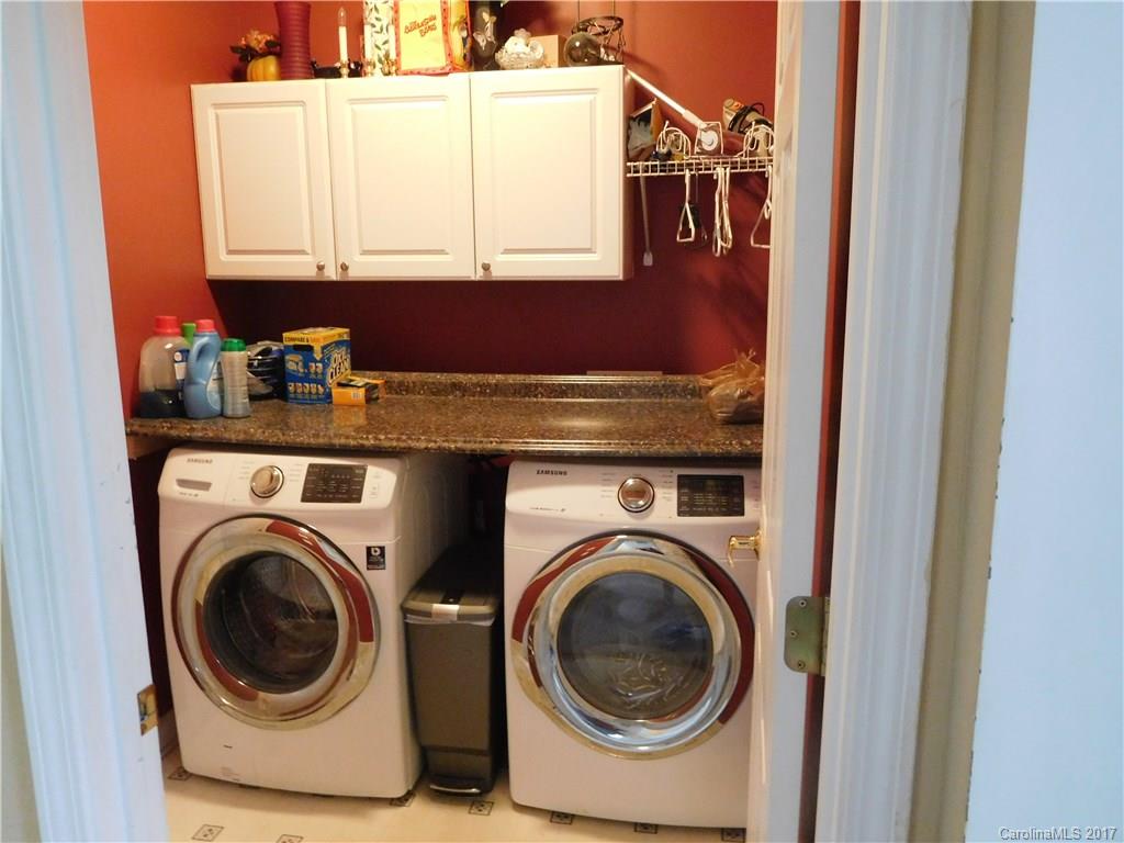 823 Knightsbridge Road Fort Mill, SC 29708 - Photo 20 of 24 a utility room with sink dryer and washer