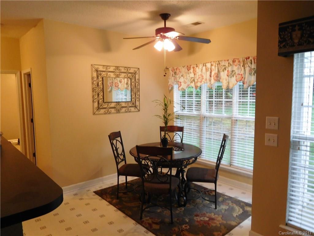 823 Knightsbridge Road Fort Mill, SC 29708 - Photo 5 of 24 a dining room with furniture and window