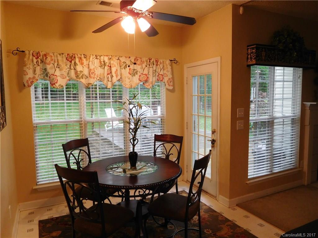 823 Knightsbridge Road Fort Mill, SC 29708 - Photo 6 of 24 a view of a dining room with furniture window and outside view