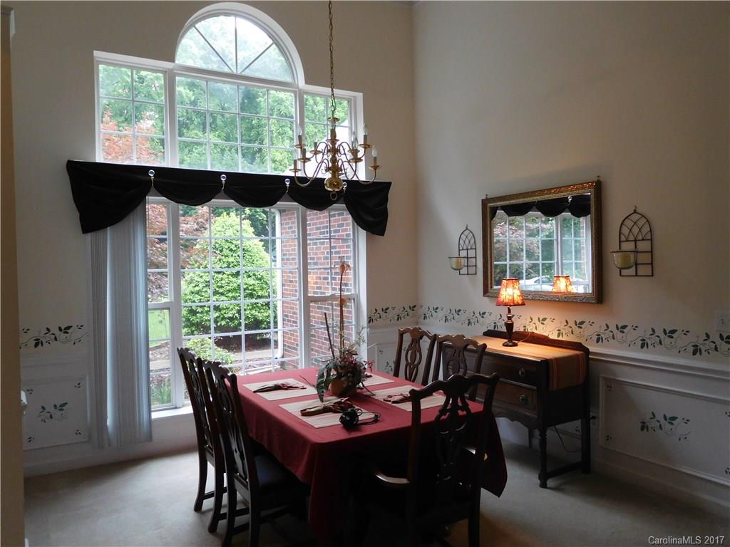 823 Knightsbridge Road Fort Mill, SC 29708 - Photo 10 of 24 a view of a dining room with furniture and window