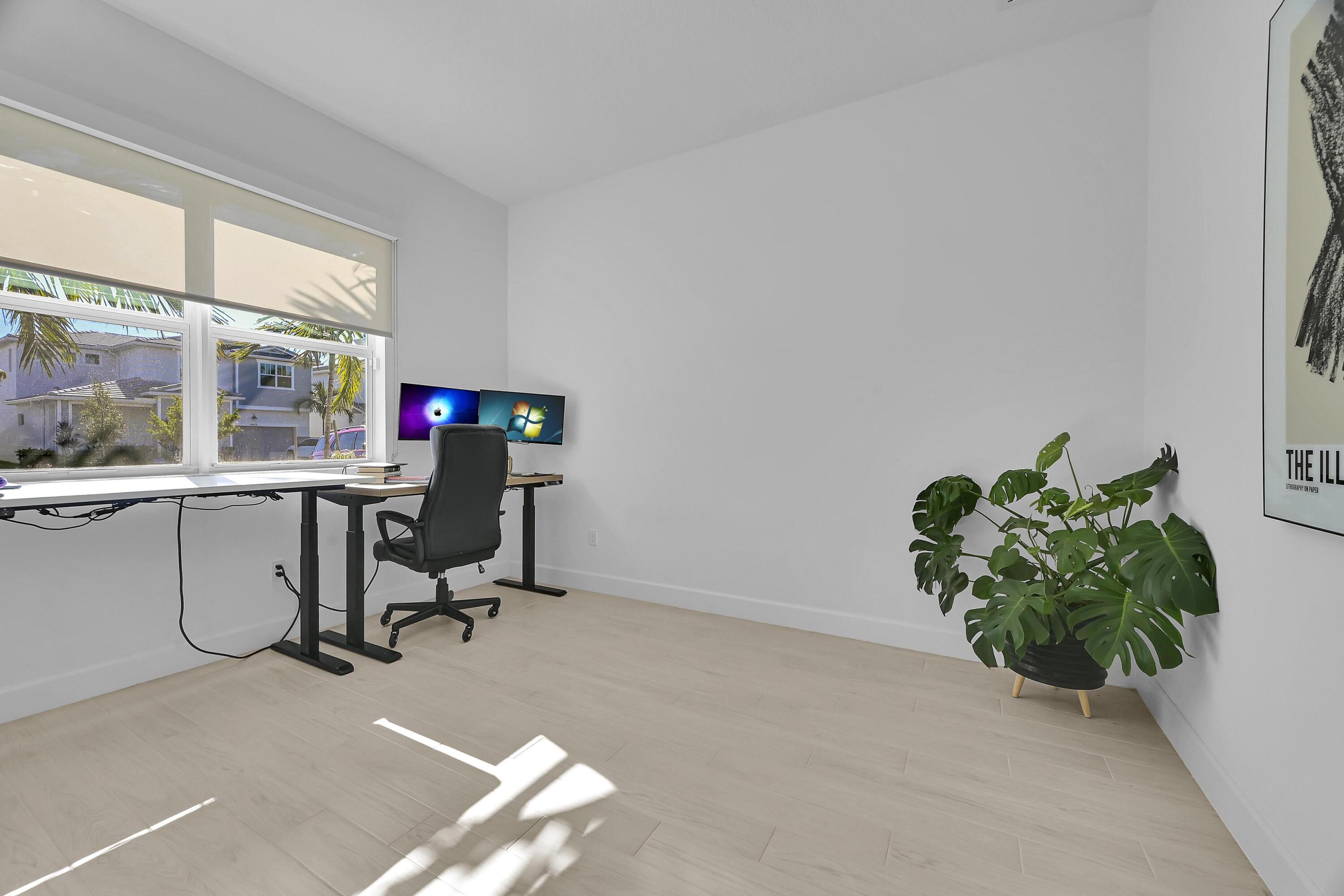 14185 Southwest Daphne St Port Port St. Lucie, FL 34987 - Photo 20 of 46 a view of workspace with a window and sitting area