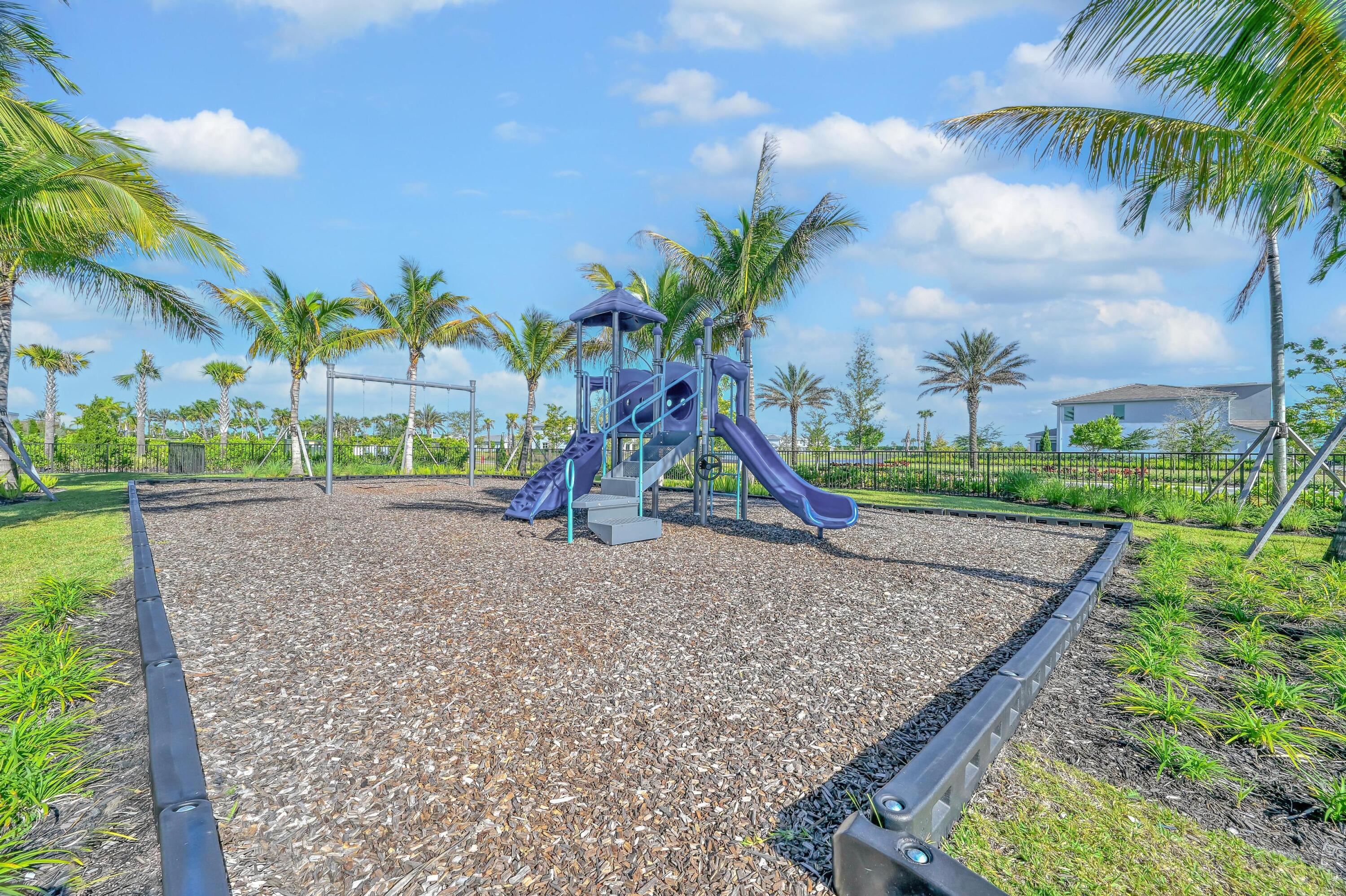 14185 Southwest Daphne St Port Port St. Lucie, FL 34987 - Photo 40 of 46 a view of outdoor space with playground and green space