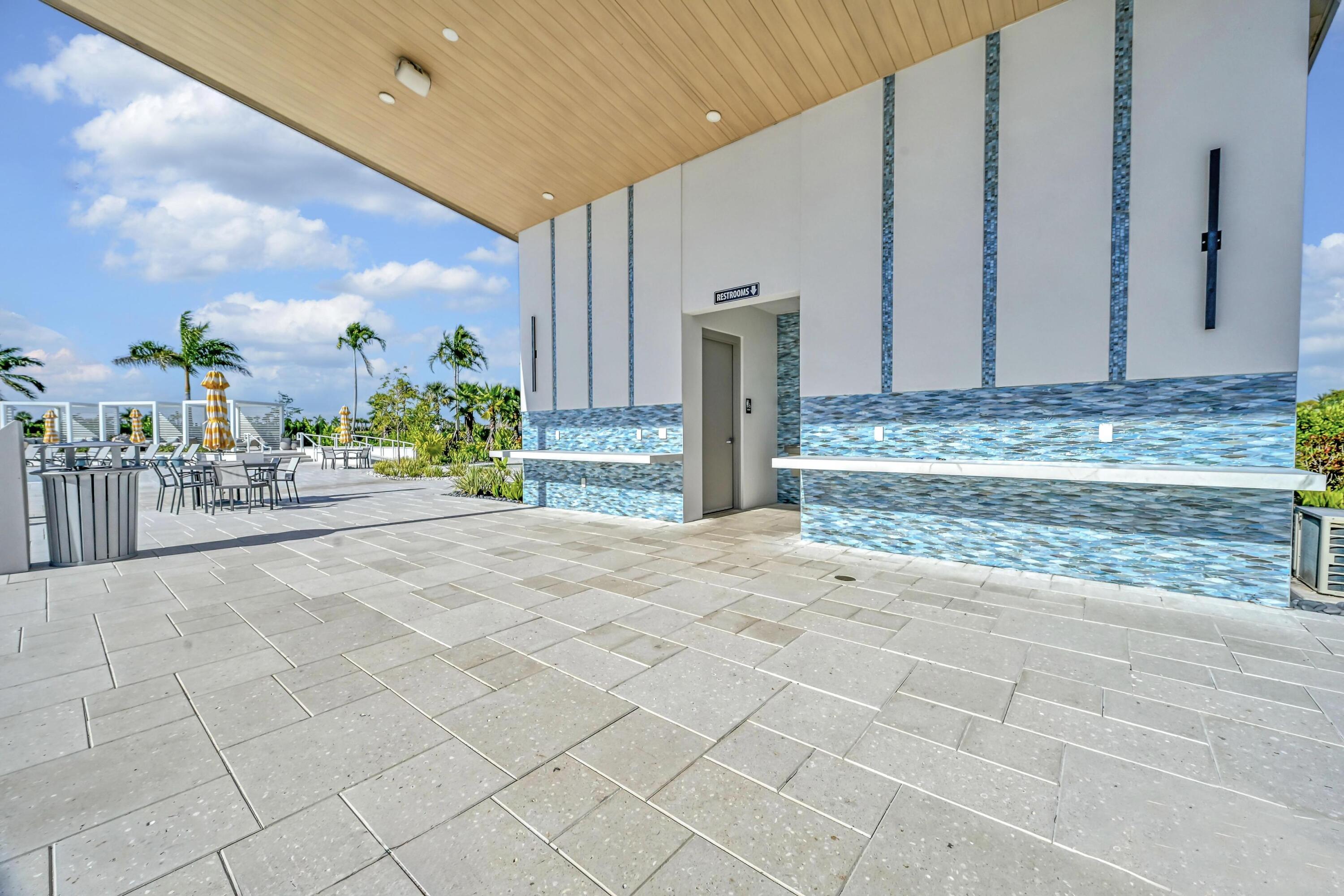 14185 Southwest Daphne St Port Port St. Lucie, FL 34987 - Photo 44 of 46 a view of a entrance gate of the house
