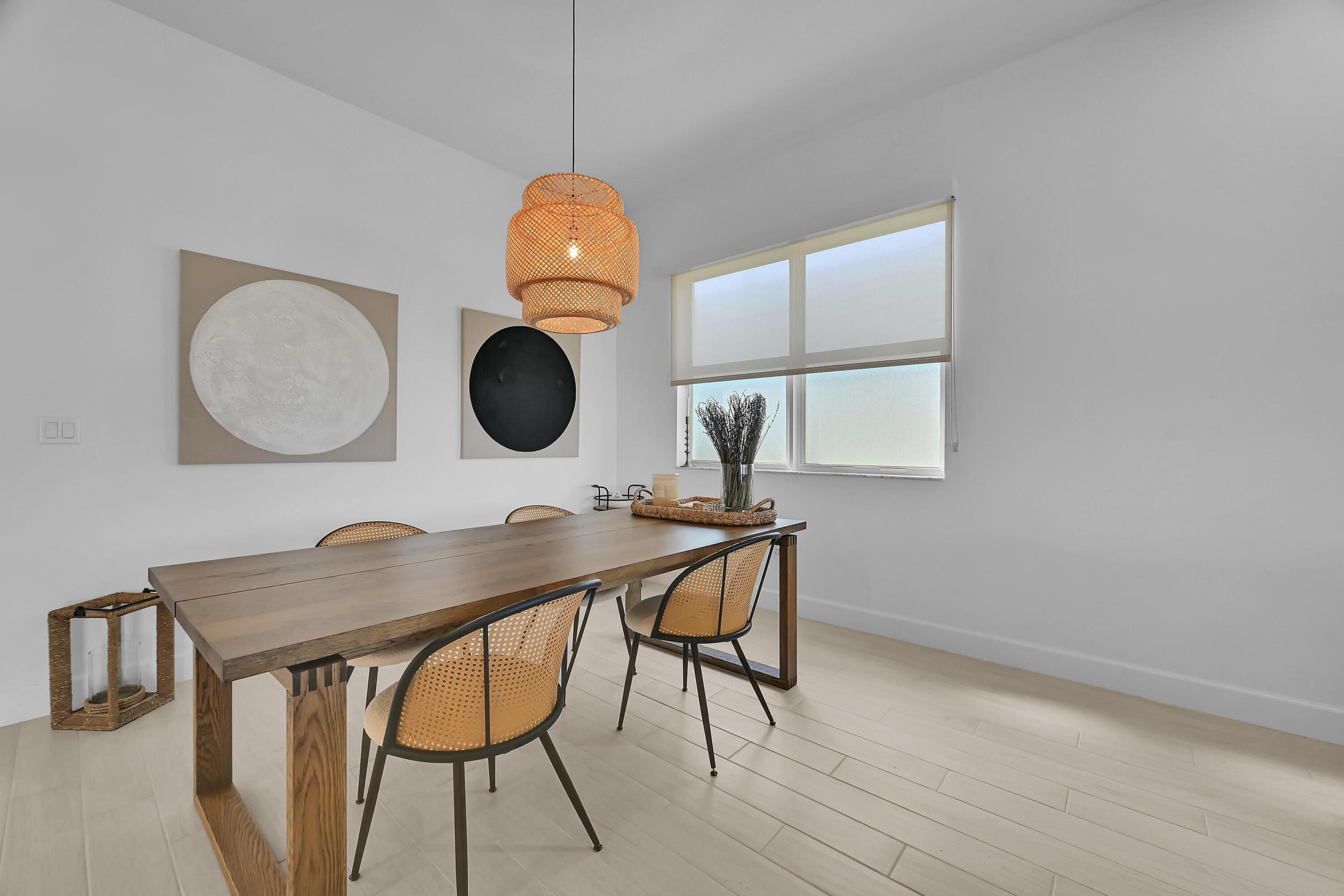 14185 Southwest Daphne St Port Port St. Lucie, FL 34987 - Photo 8 of 46 a view of a room with furniture and wooden floor