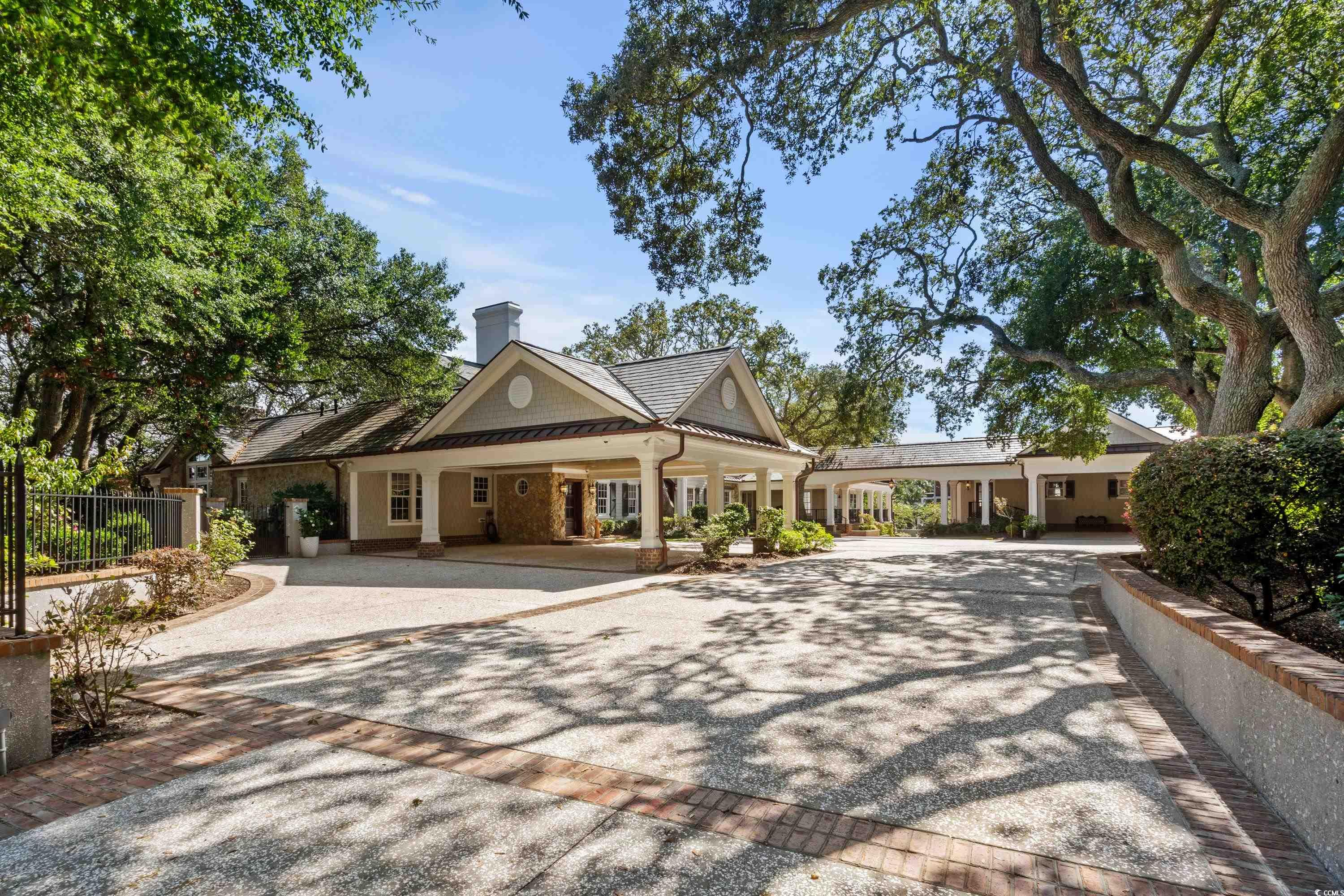3601 North Ocean Boulevard Myrtle Beach, SC 29577 - Photo 29 of 38 37th Avenue entrance is one of 2 private and gated driveways that offers a spacious living and entertaining experience.