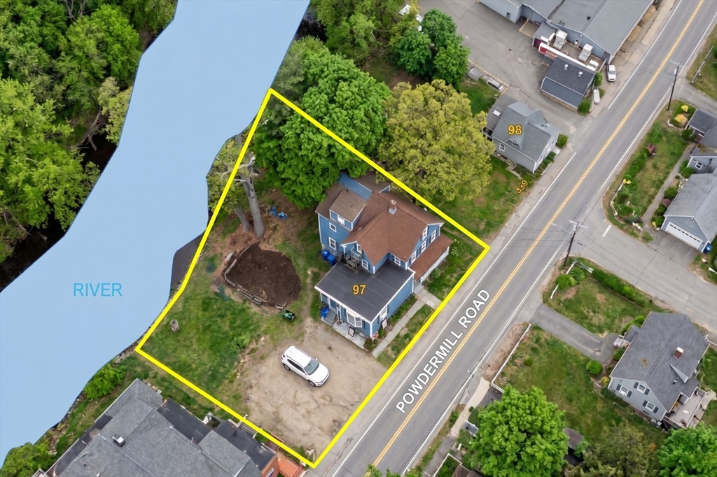 26 Powder Mill Road Maynard, MA 01754 - Photo 16 of 16 an aerial view of house with a yard