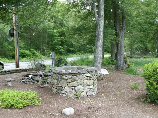4 Woodlawn Road Freetown, MA 02702 - Photo 24 of 30 a view of a forest with trees in the background